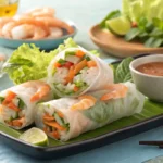 Fresh shrimp spring rolls with herbs and vegetables.